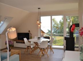 U15 OG - Komfortable Ferienwohnung mit Balkon & Kamin in Röbel an der Müritz